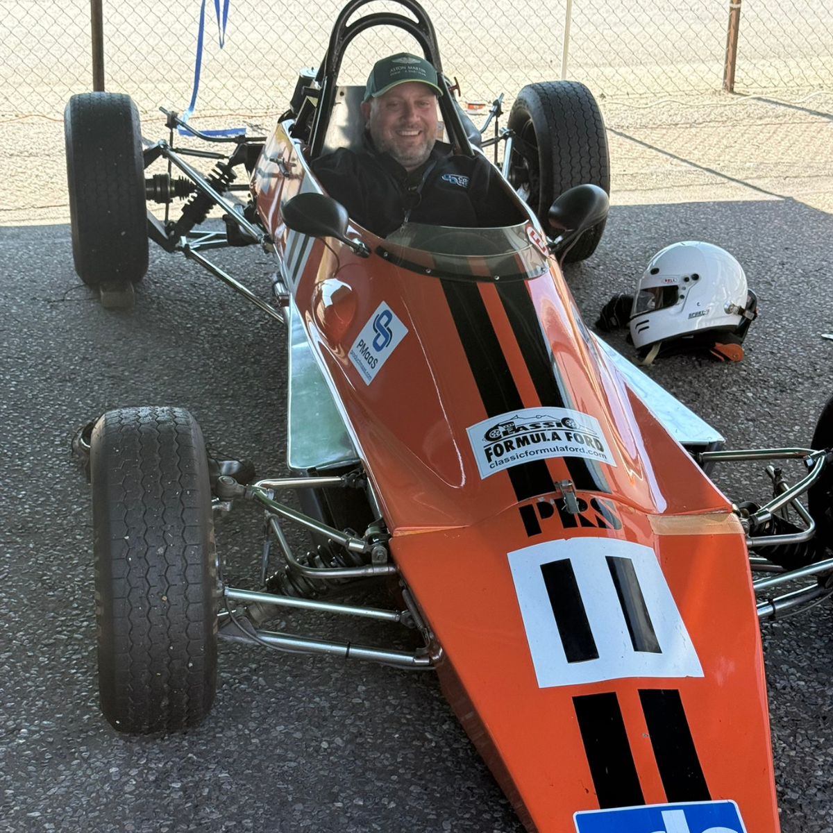 A CaaS Group guest seated in a Formula Ford car